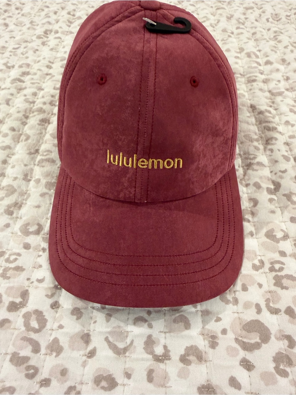 Lululemon Burgundy Bat Hat with Gold Logo